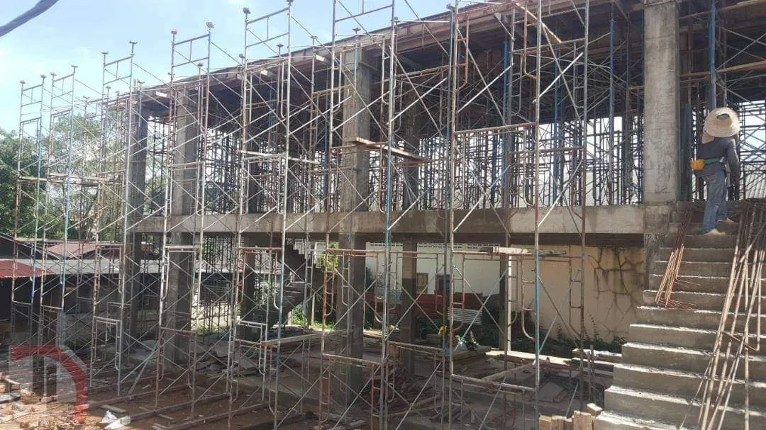 Bachang Temple Office Building two-storey concrete frame wrapped in scaffolding