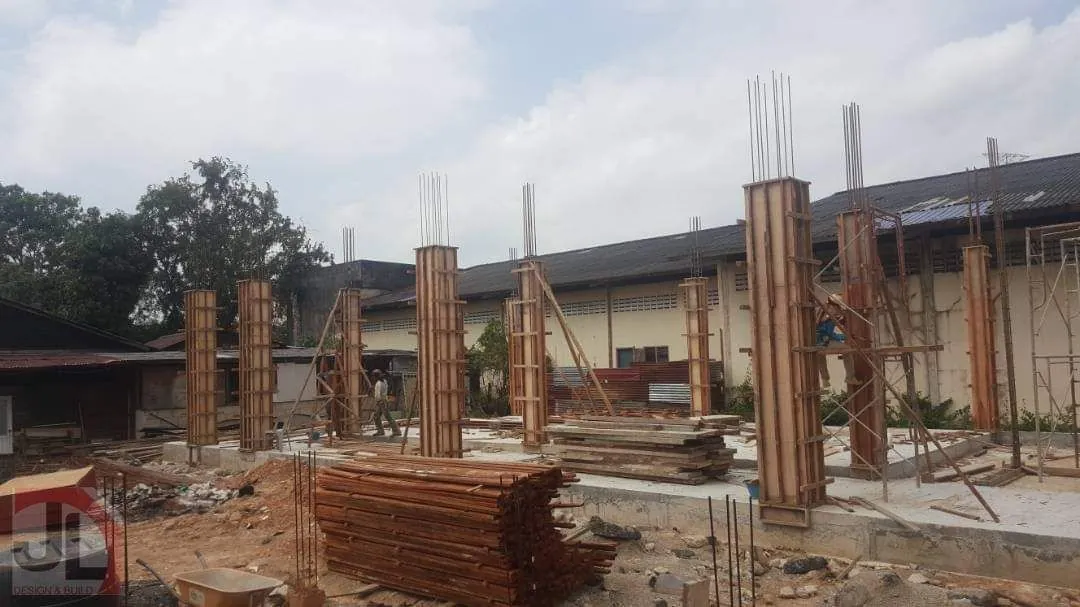 Bachang Temple Office Building timber column formwork rising on the ground slab