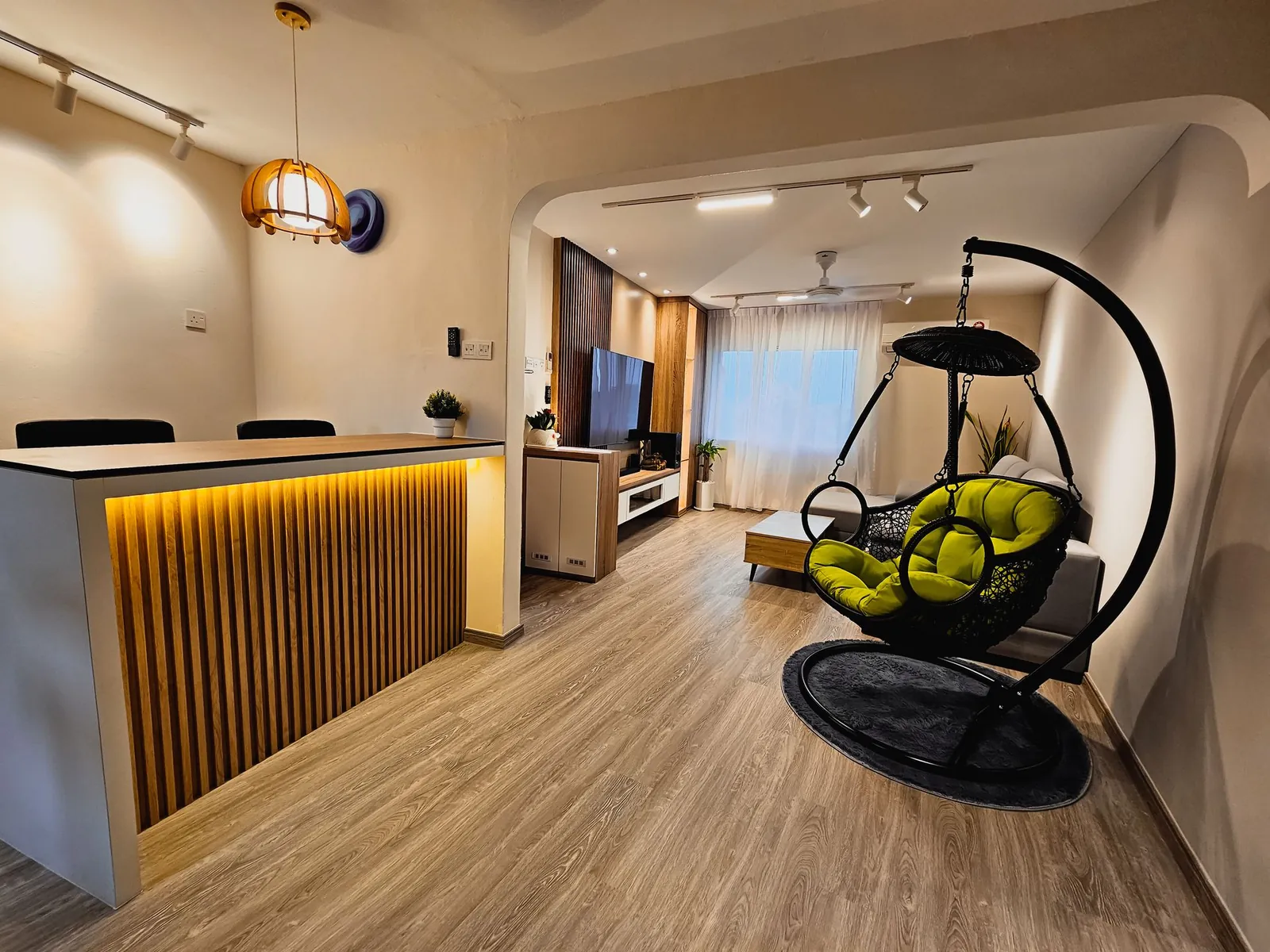 Renovated apartment with slatted LED counter and archway at Taman Kesidang