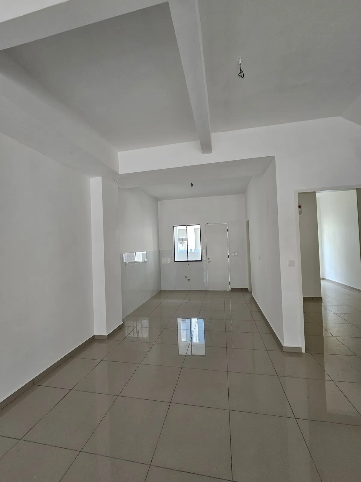 Bare tiled hall looking to the rear of a second Country Villa house