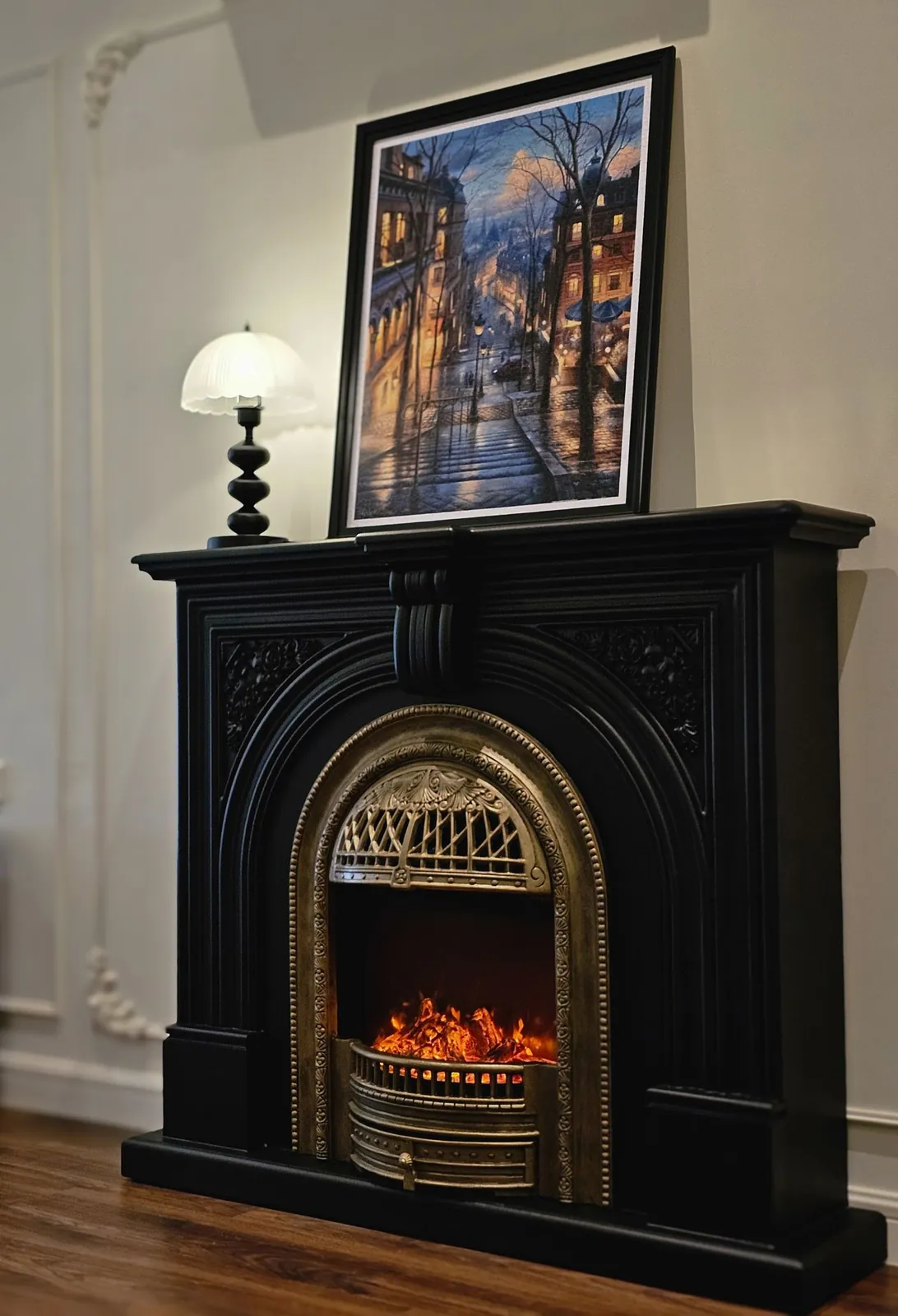 Bali Residence black fireplace mantel against moulded walls