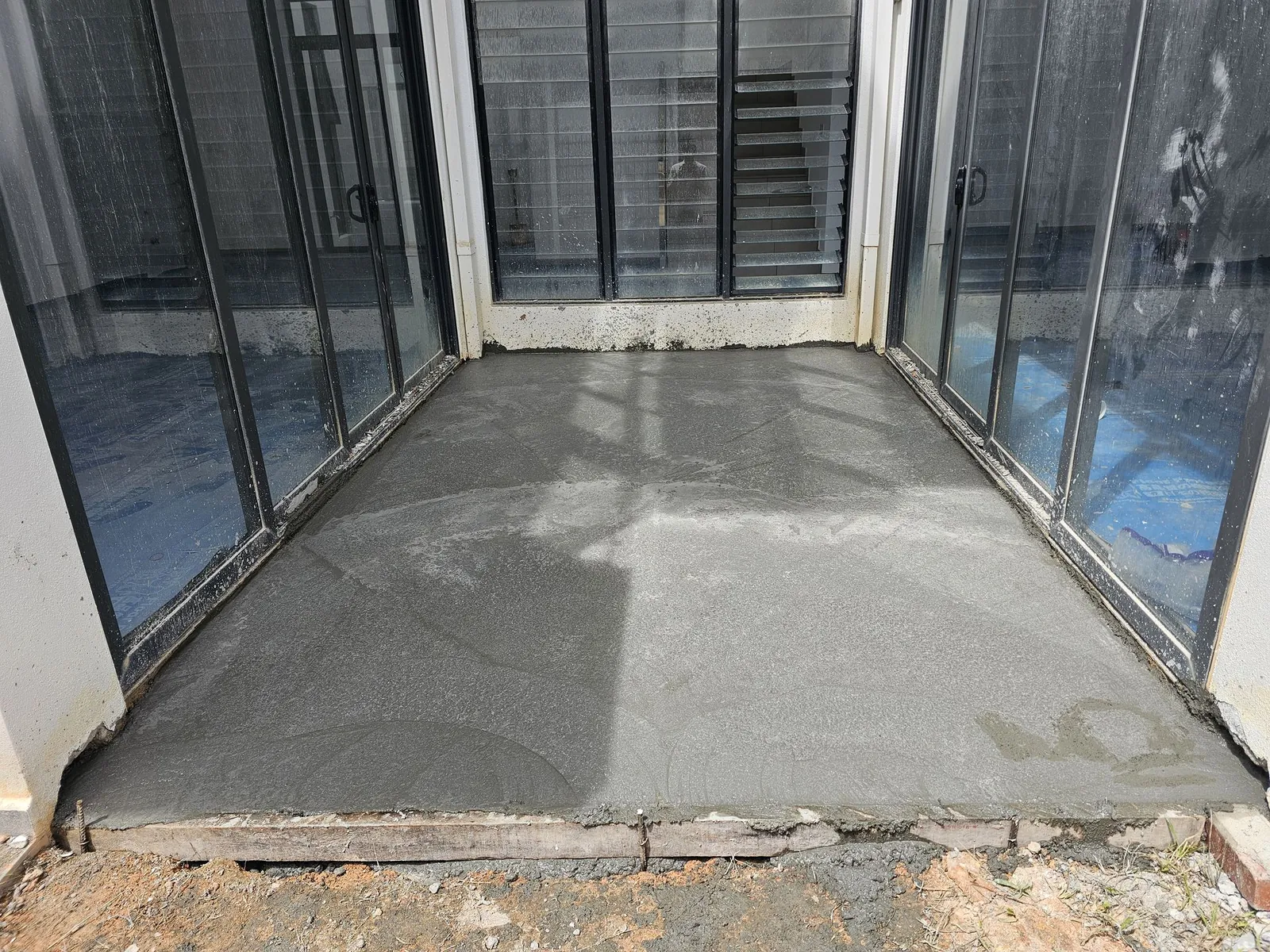 Same Country Villa light-well after a new cement screed was laid