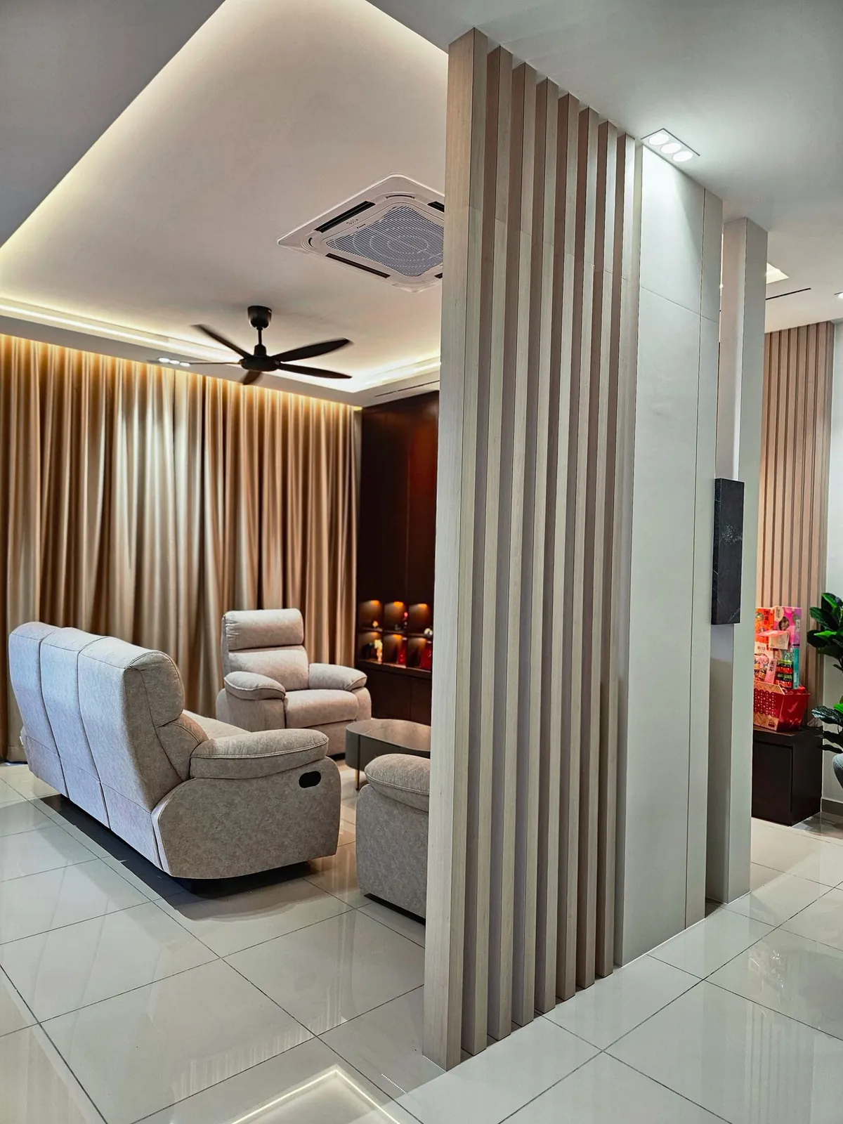 Living room seen past a wood-look slat column, cove-lit ceiling, Country Villa
