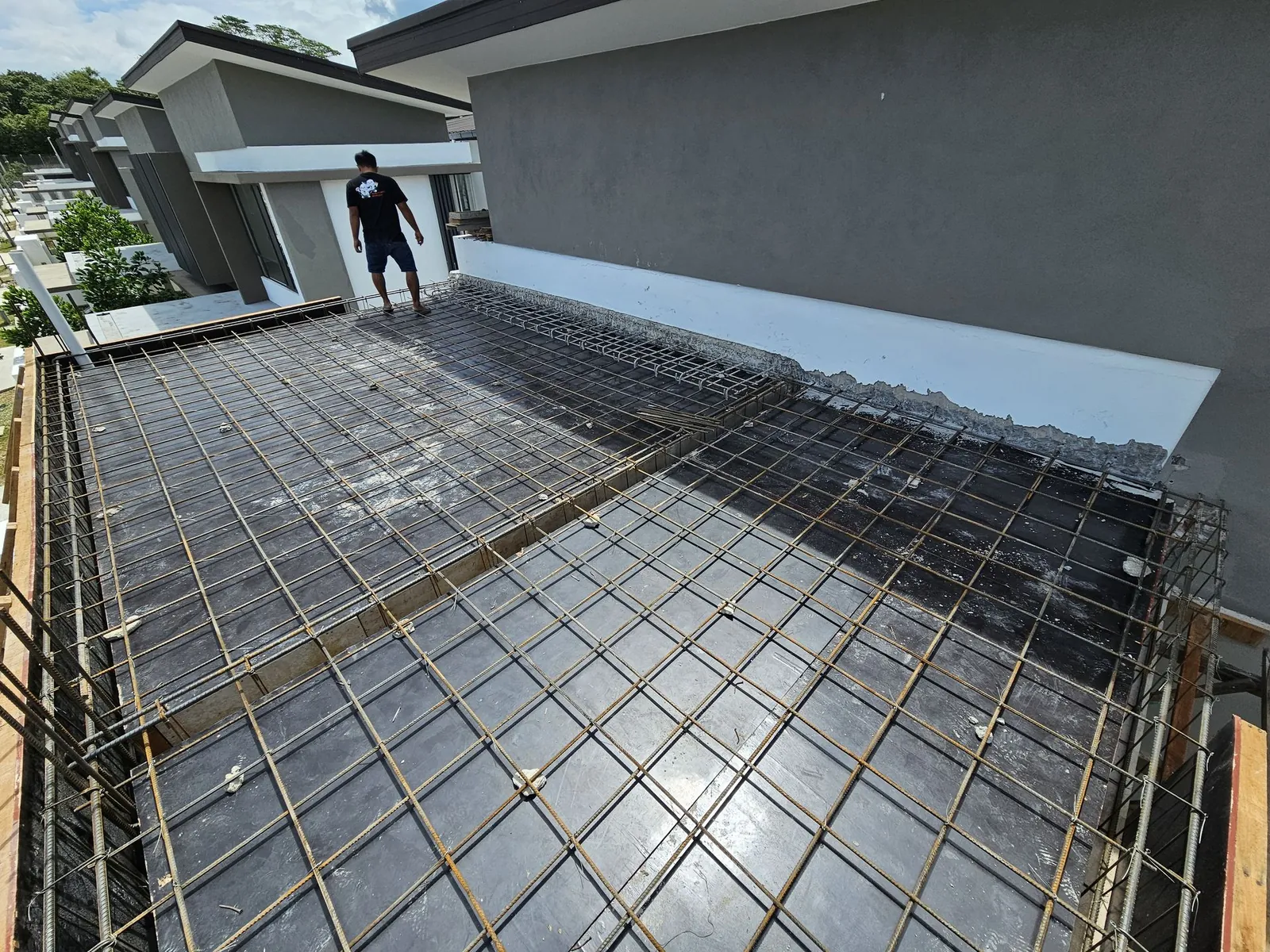 Steel mesh laid on formwork for the slab over the porch, Country Villa
